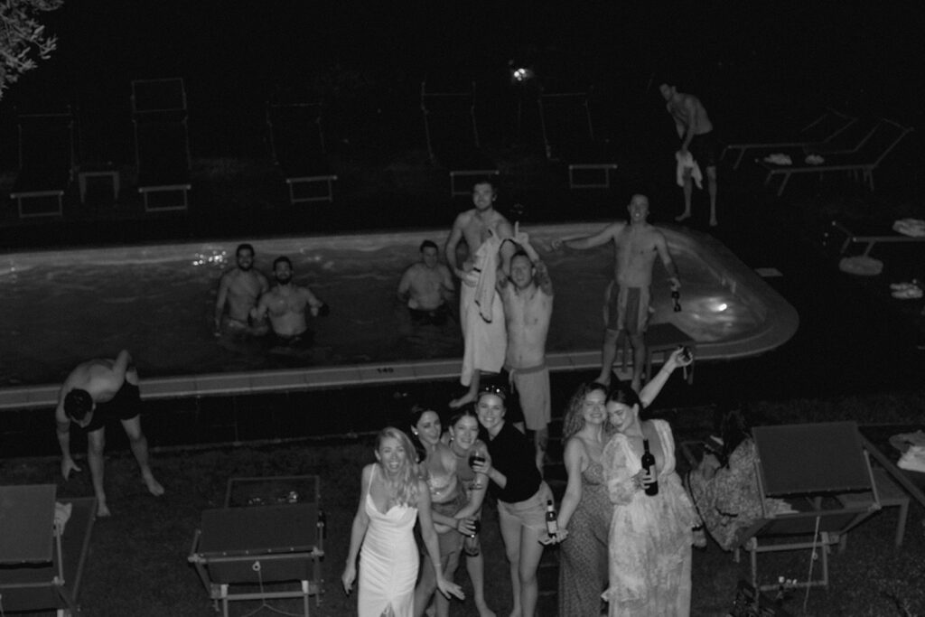 Pool party after rehearsal dinner in tuscany 