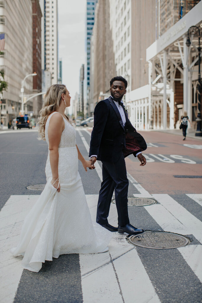 Bride and groom walking in NYC