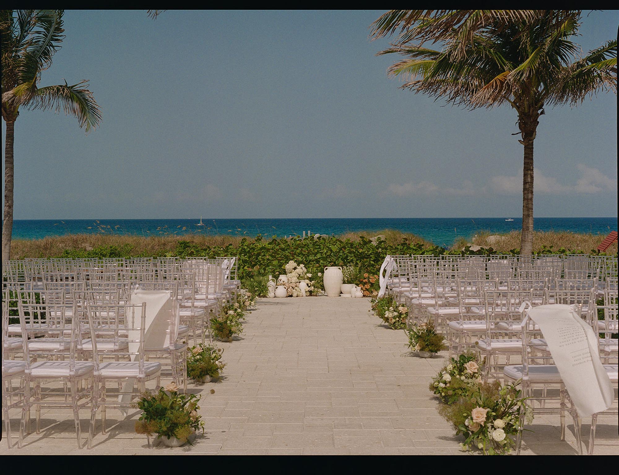 film wedding photos at Bride on the porch at delray beach club florida​