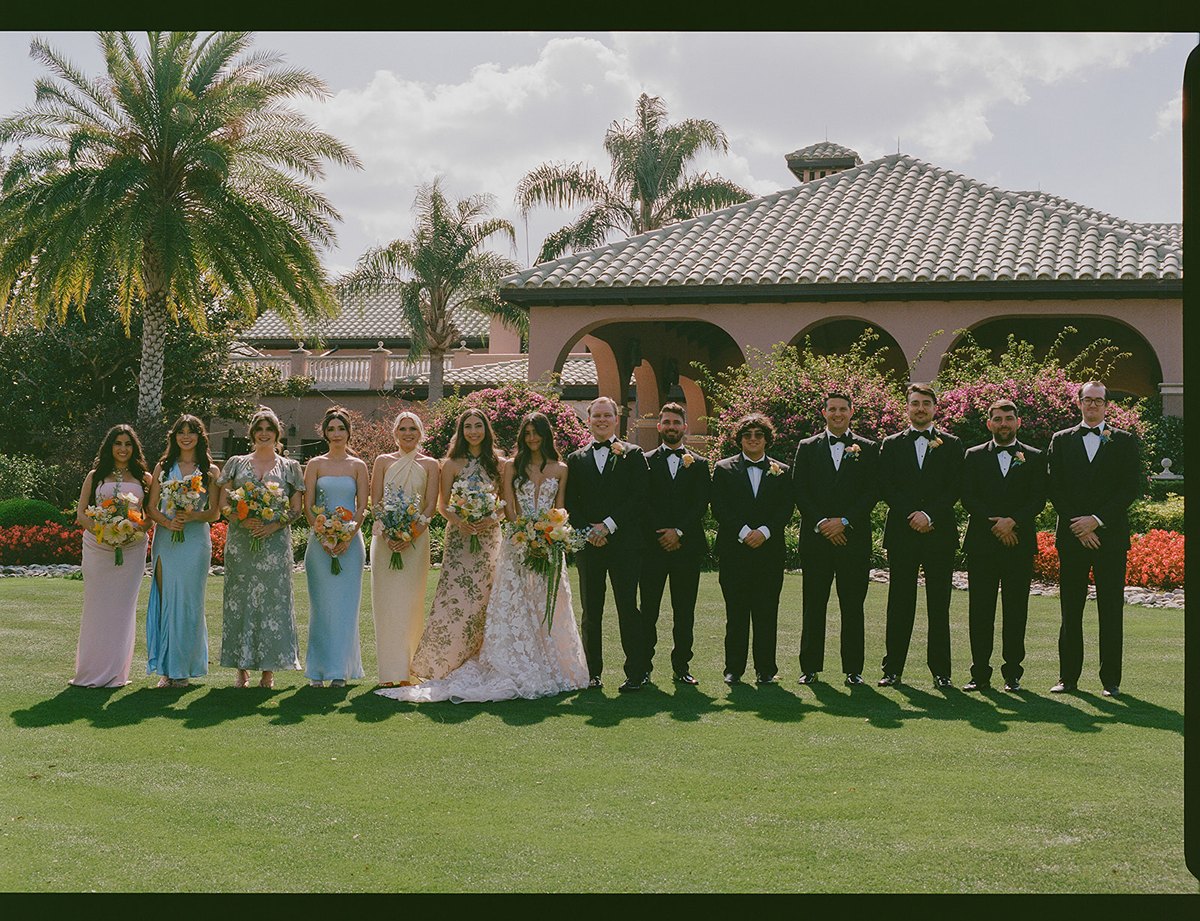 Bridal party all standing on The Lawn and Isleworth Country Club in Florida